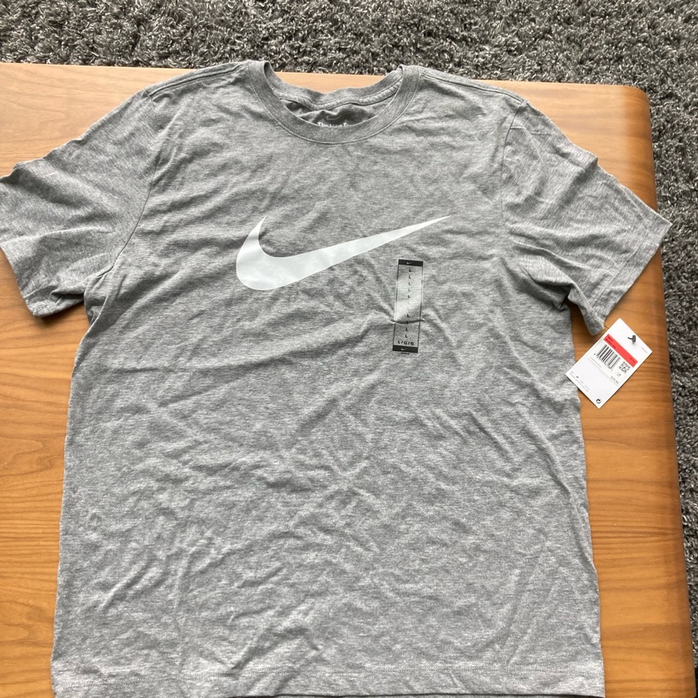 New men’s large tshirt. Tags still on never worn